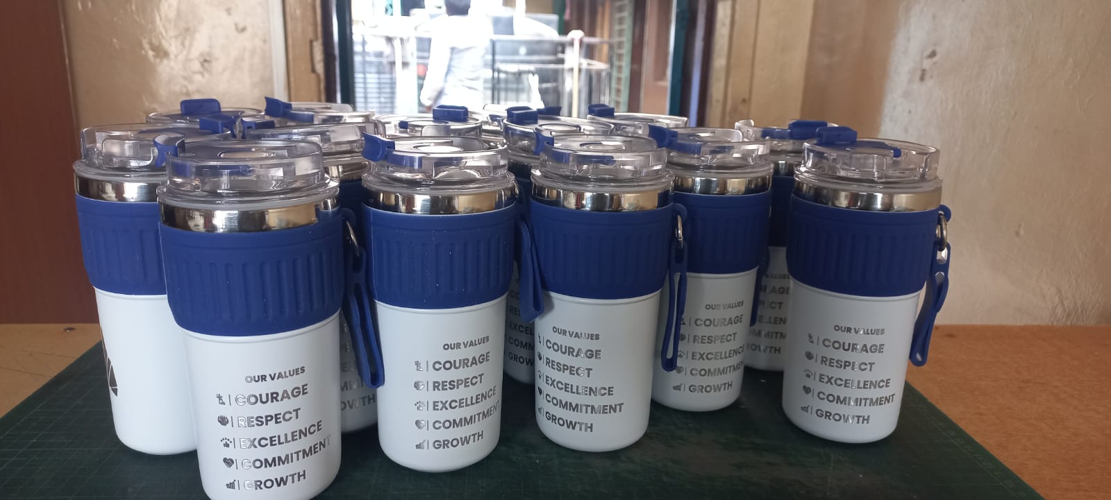 Branded travel mugs